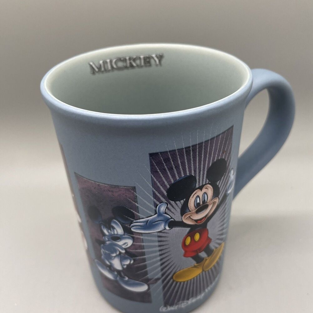 Walt Disney World Exclusive Animated Faces of Mickey Mouse Mug Cup .